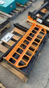 lot 103 image: Unused LandHonor 4000lb Skid Steer Pallet Fork Attachment