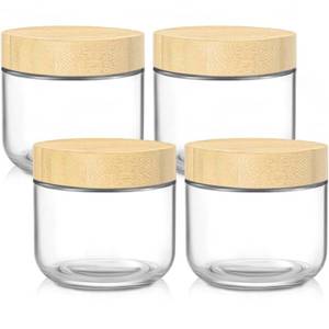 lot 1385 image: DRKIO 10 Oz Overnight Oats Containers with Bamboo Lids - 4 Pack Glass Storage Jars with Airtight Lids Wide Mouth Mason Food Jars Great for Meal Prep Salad Chia Pudding Snacks Yogurt Sugar Spice