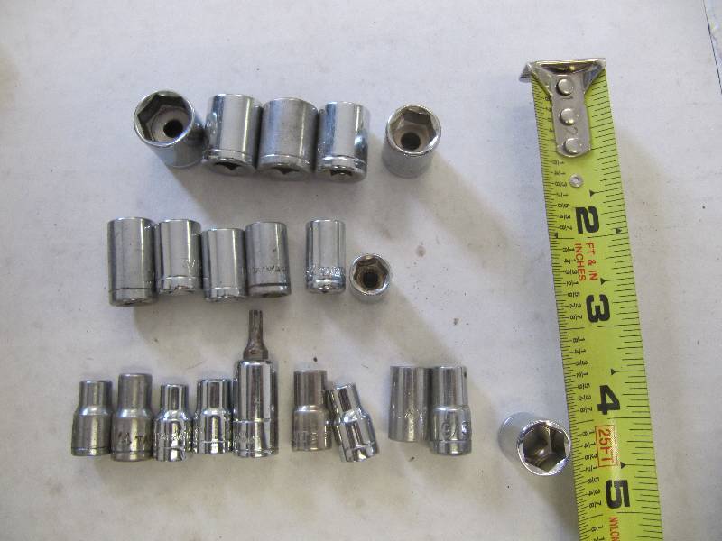 lot 712 image: Lot of (21)  1 4 Sockets  (Shop Tools)