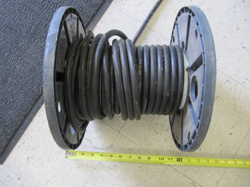 lot 738 image: Partially Used  Spool of 600 Volt Welding Cable ( Shop Tools)