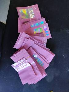 lot 20174 image: Pink Holographic Zip Lock Bags - Bulk Pack
