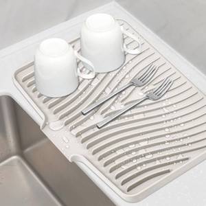 lot 53547 image: FACTORY SEALED - TIKNIK Silicone Dish Drying Mat for Kitchen Counter, Dish Drying Pad, Non-Slip Drain Pad with Built-in Drain, Heat Resistant Stone Drying Mat(15.8 x 13 Cream)