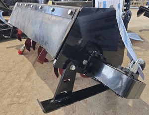 lot 4267 image: Unused 2025 Industrial-Grade Professional Hydraulic Rotary Tiller Attachment Designed for Mini Skid Steer Loaders - Built for Durability & Precision, Ideal for Soil Preparation, Cultivation & Landscaping Projects.