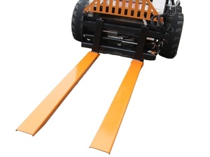 lot 4064 image: 2025 Unused Wolverine 7ft Pallet Fork Extensions - For forklifts, telehandlers, and lift trucks allow the operator to get extra length out of their forks in order to maximize machine performance.