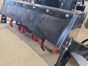 lot 4310 image: Unused 2025 Industrial-Grade Professional Hydraulic Rotary Tiller Attachment Designed for Mini Skid Steer Loaders - Built for Durability & Precision, Ideal for Soil Preparation, Cultivation & Landscaping Projects.
