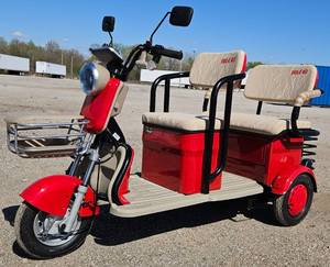 lot 4358 image: UNUSED 2025 - Red Mini Golf CartTrike IRGC40 - Wall Charger - Remote Security System - Lights - Horn - Under Seat Storage - Small But Powerful Some Assembly Required
