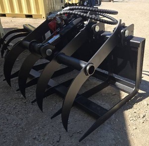 lot 4286 image: Unused 2025 Industrial-Grade Hydraulic Grab WoodHay Fork Attachment Designed for Mini Skid Steer Loaders - 360 Degree Rotation for Precise Log Positioning - Hardened Steel Tines Penetrate Wood Piles - Dual Cylinders