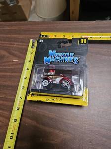 lot 25 image: 1941 Willys Coupe Muscle Machines Diecast Car