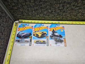lot 46 image: Hot Wheels Collection - TV Series Batmobile, Aston Martin DB4GT High-Speed Edition, and Tesla Cyberquad