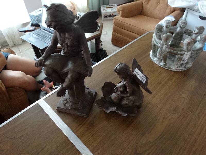 lot 8025 image: pair of fairy statues