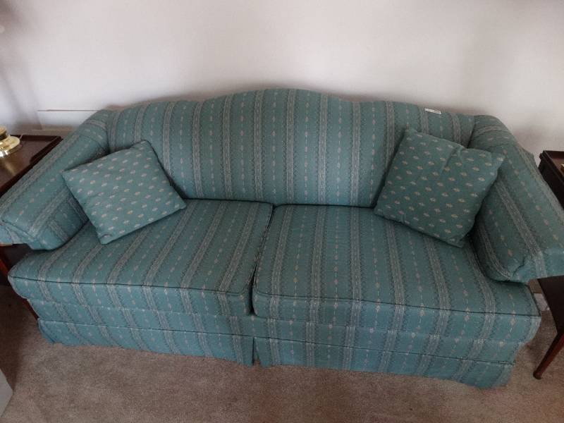 lot 8045 image: Masquerade sofa sleeper with two throw pillows