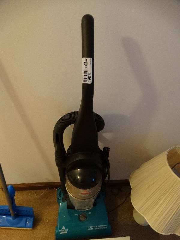 lot 8061 image: Bissel vaccum comes with attachments.
