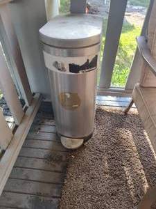 lot 223 image: Simple human trash can.