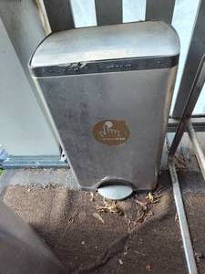 lot 259 image: Simple human trash can.