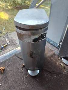 lot 260 image: Simple human trash can.