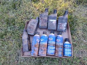 lot 262 image: (5) Oil treatment and (5) Premium starting fluid.