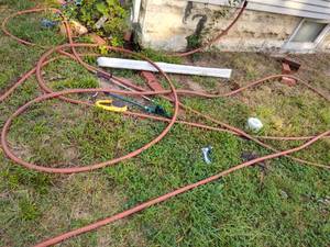 lot 266 image: Hose, hose sprayer and sprinkler.