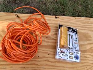 lot 269 image: Air compressor stater kit and air compressor hose.