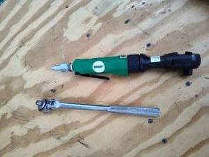 lot 305 image: Air compressor Speedaire and ratchet.