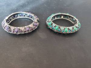 lot 314 image: (2) Clip on bracelet.