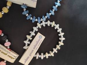 lot 326 image: (3) Share Your Adventure Necklaces.