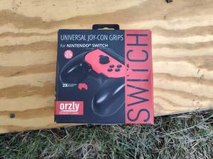 lot 307 image: Brand new universal joy-con grips.