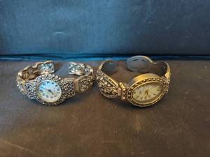 lot 335 image: (2) Quartz Watches.