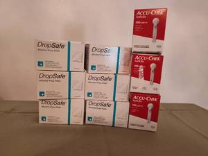 lot 465 image: (6) Boxes of Alcohol Pads and (3) Accu-Check Lights.