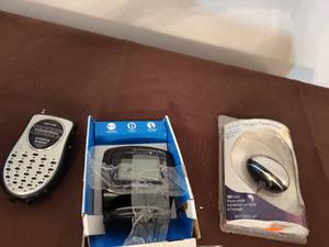 lot 379 image: Sports Radio, Universal Charger and Alarm Clock.