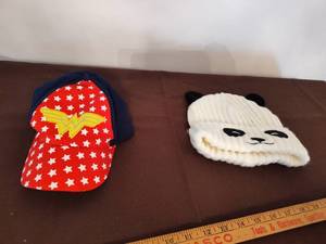 lot 381 image: Wonder Woman Hat and Panda Beanie.