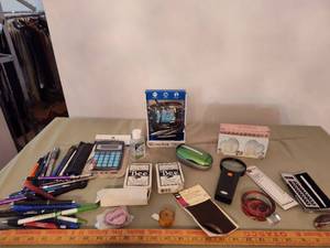 lot 510 image: Playing Cards, Writing Utensils, Magnifier and more.