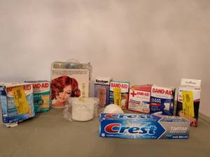 lot 549 image: Band-Aids, Crest and more.
