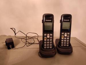 lot 604 image: (2) Panasonic Phones with Docks.