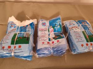 lot 607 image: Packs of Ponchos.