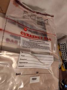 lot 664 image: Currency Bags.