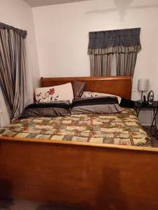 lot 671 image: King Sized Bed and Frame.