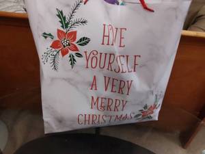 lot 688 image: Christmas Bags and Tissue Paper.