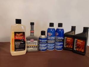 lot 348 image: Starter Fluid, Oil Treatment, Mirror Glaze, and Fuel System Cleaner.