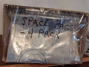 lot 351 image: 4pk of Space Bags.