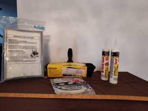 lot 352 image: Kwik Seal, Weather Strip, Drywall Repair Kit, HEPA Filter.