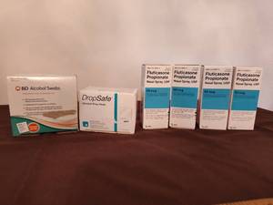 lot 353 image: Nasal Spray and Alcohol Pads.