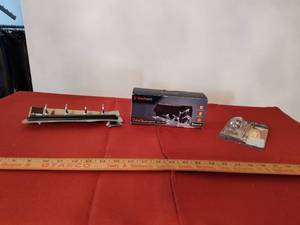 lot 413 image: Black Web Stereo Bluetooth, Key Rack and Light Bulb.