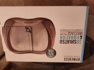 lot 713 image: HoMedics Vibrations and Massage Pillow with Heat.
