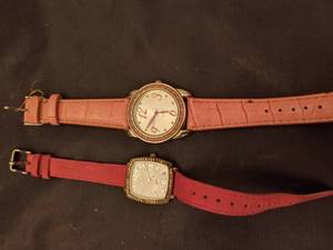 lot 721 image: (2) Pink Quartz Watches.