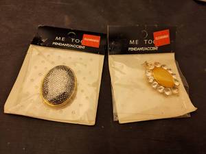 lot 737 image: (2) Me Too Pendants.