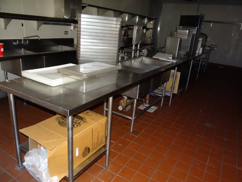 lot 4270 image: 29FT Stainless Prep Table with (2) Sinks