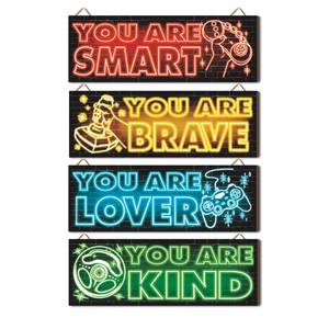 lot 2040 image: Dazzlewall 4pcs Game Room Wall Decor, Teen Boys Wooden Room Decor for Video Game Inspirational Quote Signs for Playroom Bedroom Dorm Hanging Plaques, 11.4x3.9 in - Retail $12