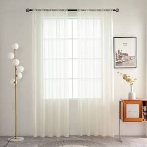 lot 2145 image: SpaceDresser Basic Rod Pocket Sheer Voile Window Curtain Panels White 1 Pair 2 Panels 60 Width 63 Inch Long for Kitchen Bedroom Children Living Room Yard(Ivory,60 W x 63 L) - Retail $16
