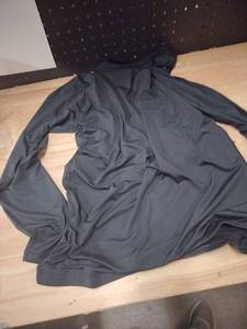 lot 2347 image: Long sleeve black exercise shirt large to extra large