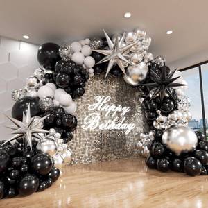 lot 2372 image: ADOINBY Black and Silver White Balloon Arch Kit, 140Pcs Explosion Star Black and Silver White Balloon 22 18 12 10 5 Inch Different Size Balloons for Birthday Anniversary New Years Party Decorations - Retail $10
